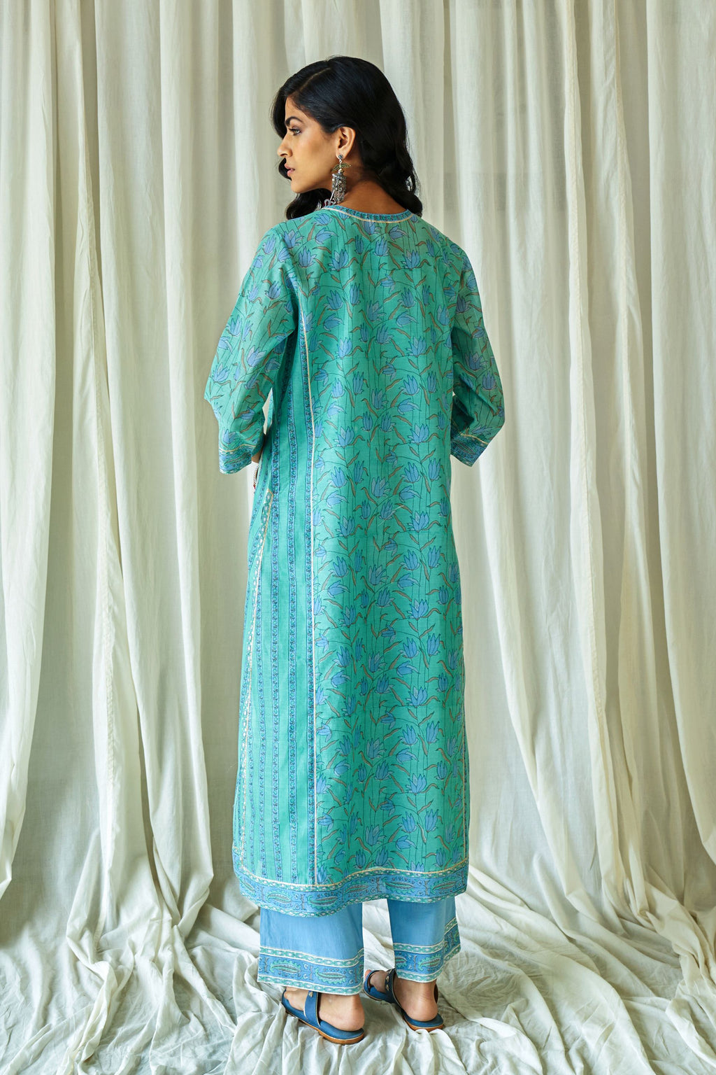 Persian straight kurta in assorted hand block prints with front placket and side panels.