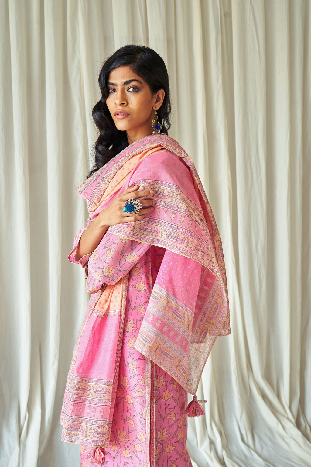 Pink and peach hand block printed cotton chanderi dupatta with silver gota detailing at edges.