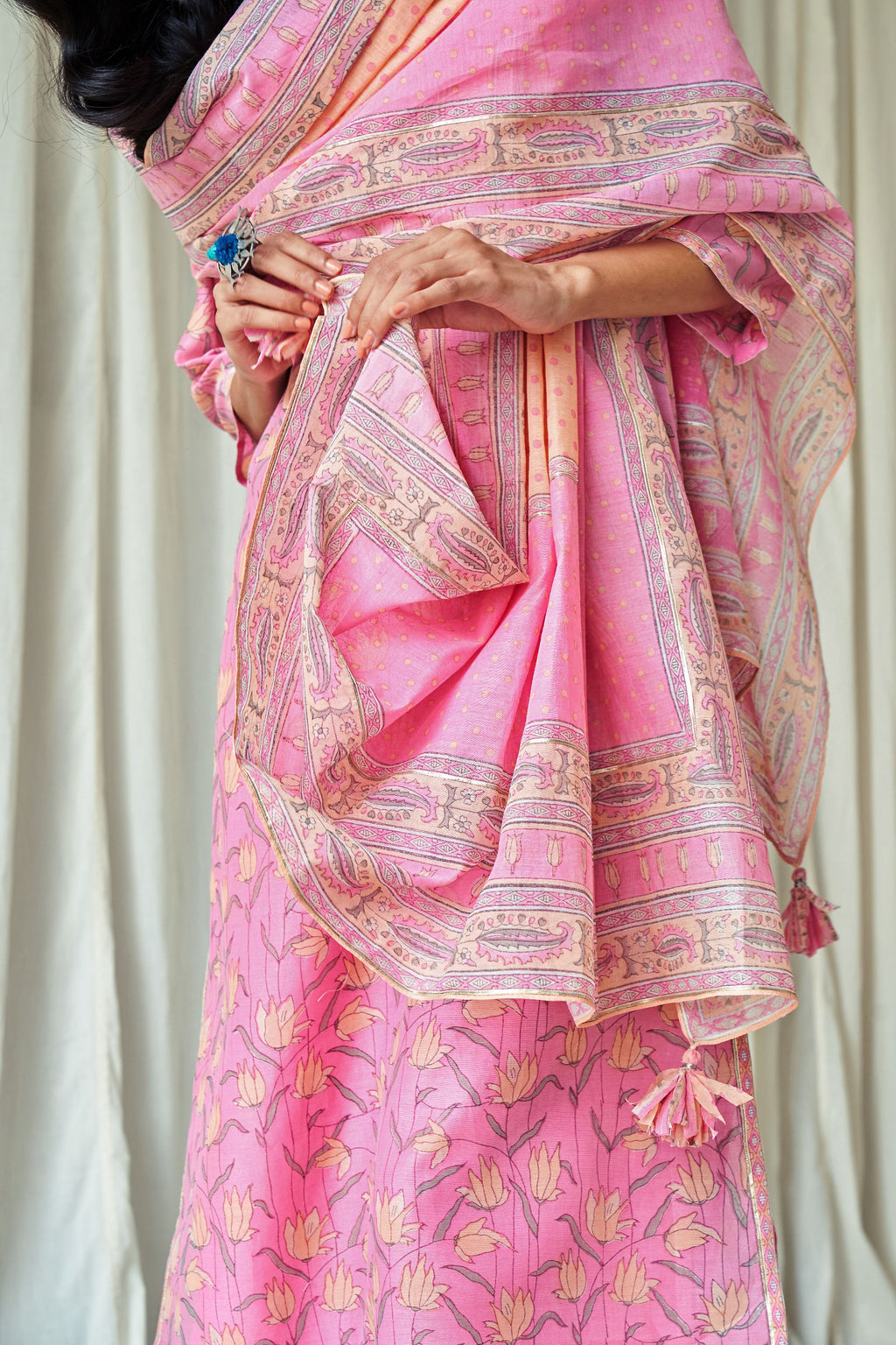 Pink and peach hand block printed cotton chanderi dupatta with silver gota detailing at edges.