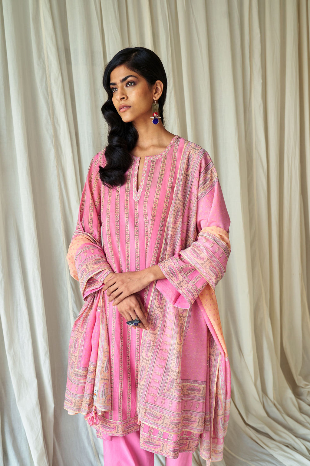 Pink and peach hand block printed cotton chanderi dupatta with silver gota detailing at edges.