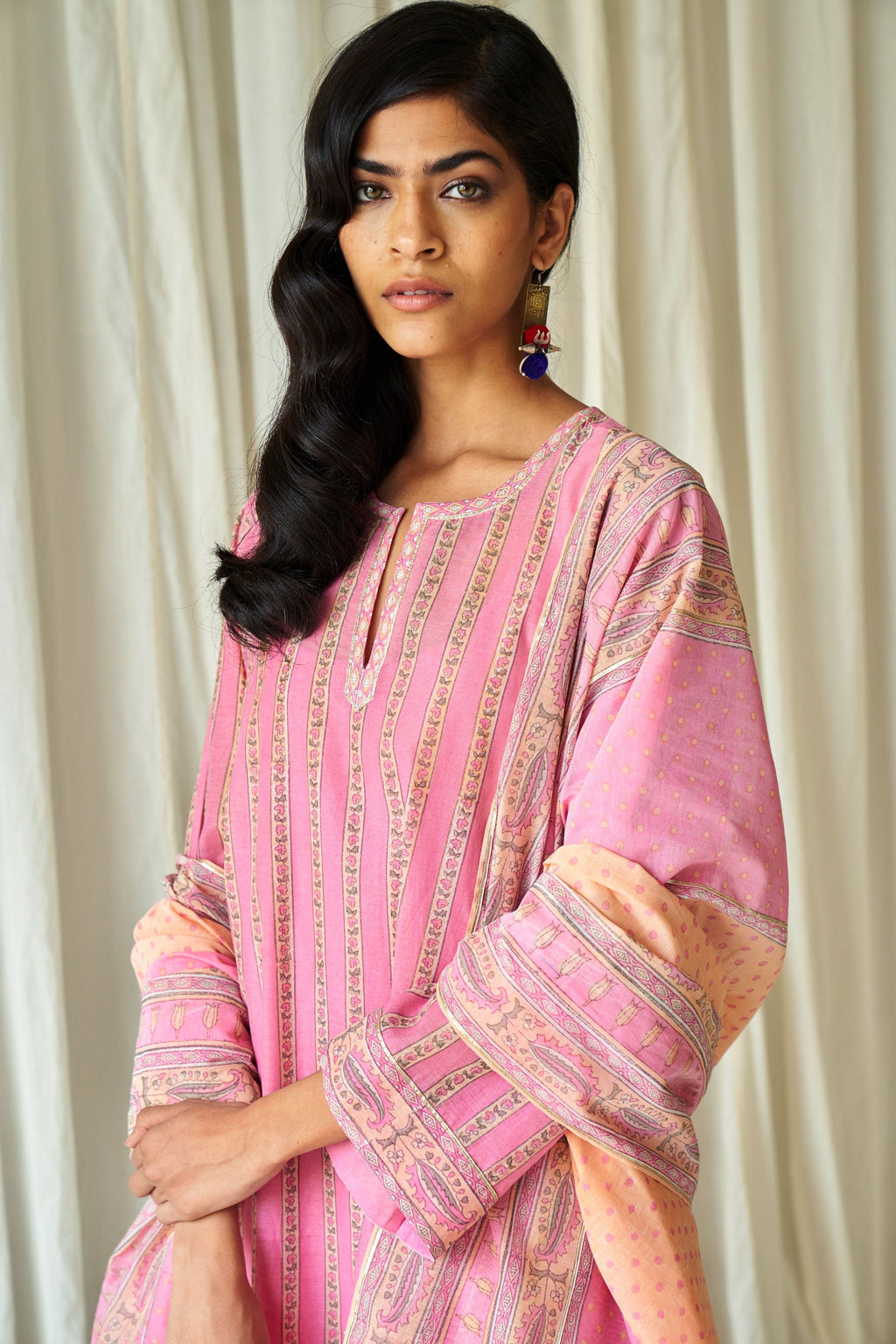 Pink and peach hand block printed cotton chanderi dupatta with silver gota detailing at edges.