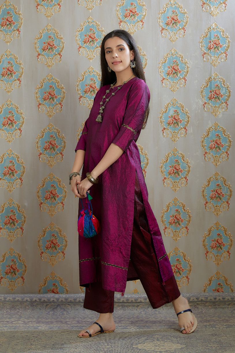 Wine hand crushed silk kurta with pulled thread embroidery, paired with hand crushed straight silk pants