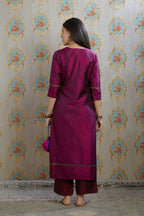 Wine hand crushed silk kurta with pulled thread embroidery, paired with hand crushed straight silk pants