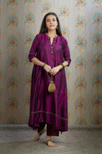 Asymmetric hem aubergin hand crushed silk kurta set with pulled thread embroidery