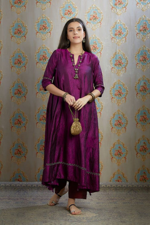 Asymmetric hem aubergin hand crushed silk kurta set with pulled thread embroidery