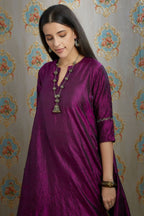 Asymmetric hem aubergin hand crushed silk kurta set with pulled thread embroidery