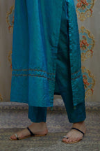 Teal blue hand crushed silk kurta set with pin tucks at placket, highlighted with pulled thread embroidery