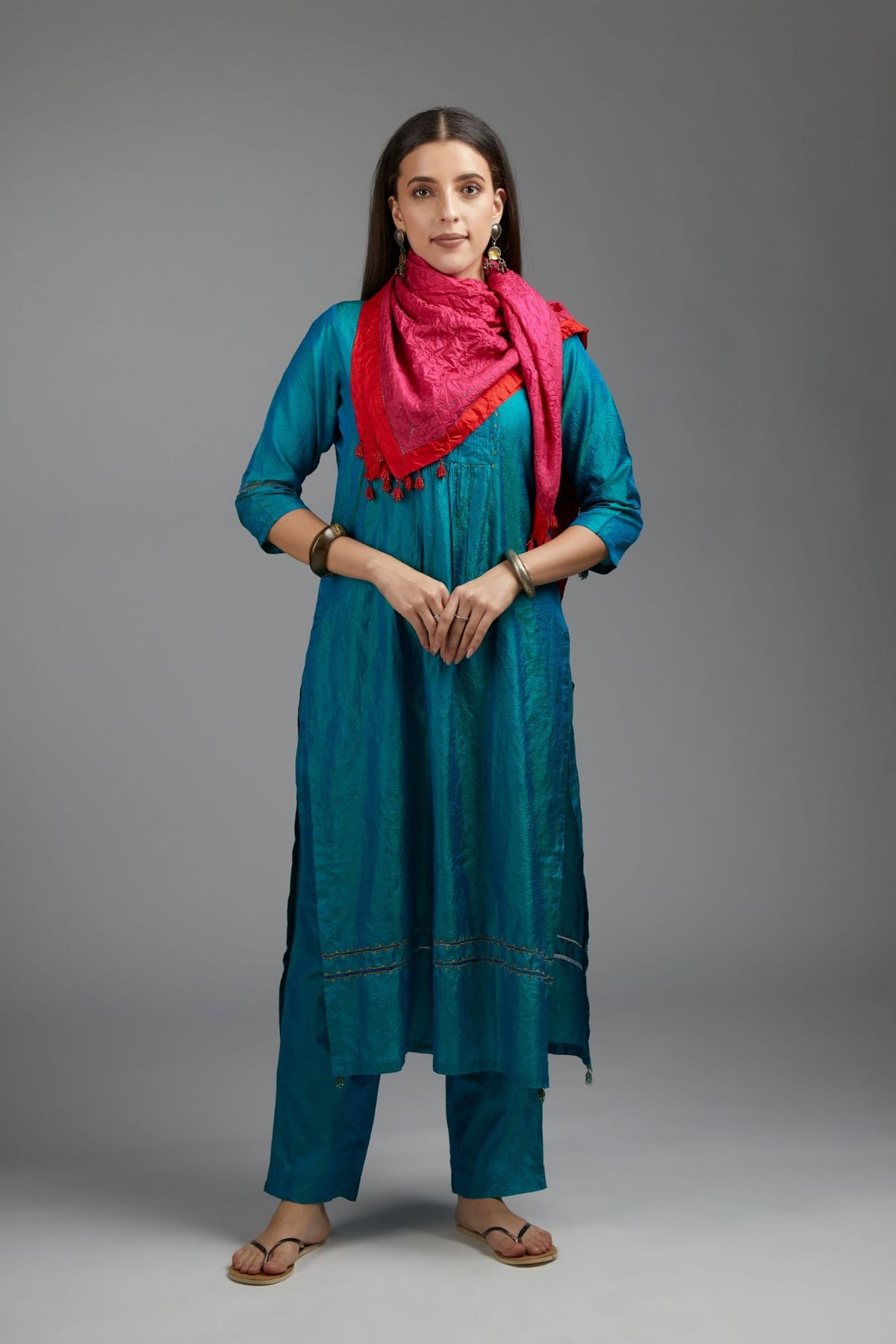 Teal blue hand crushed silk kurta set with pin tucks at placket, highlighted with pulled thread embroidery