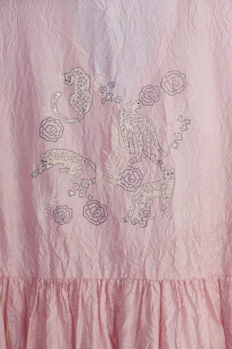 Pink hand-crushed silk kurta set with wavy empire waistline and gathers, highlighted with delicate sequins embroidery