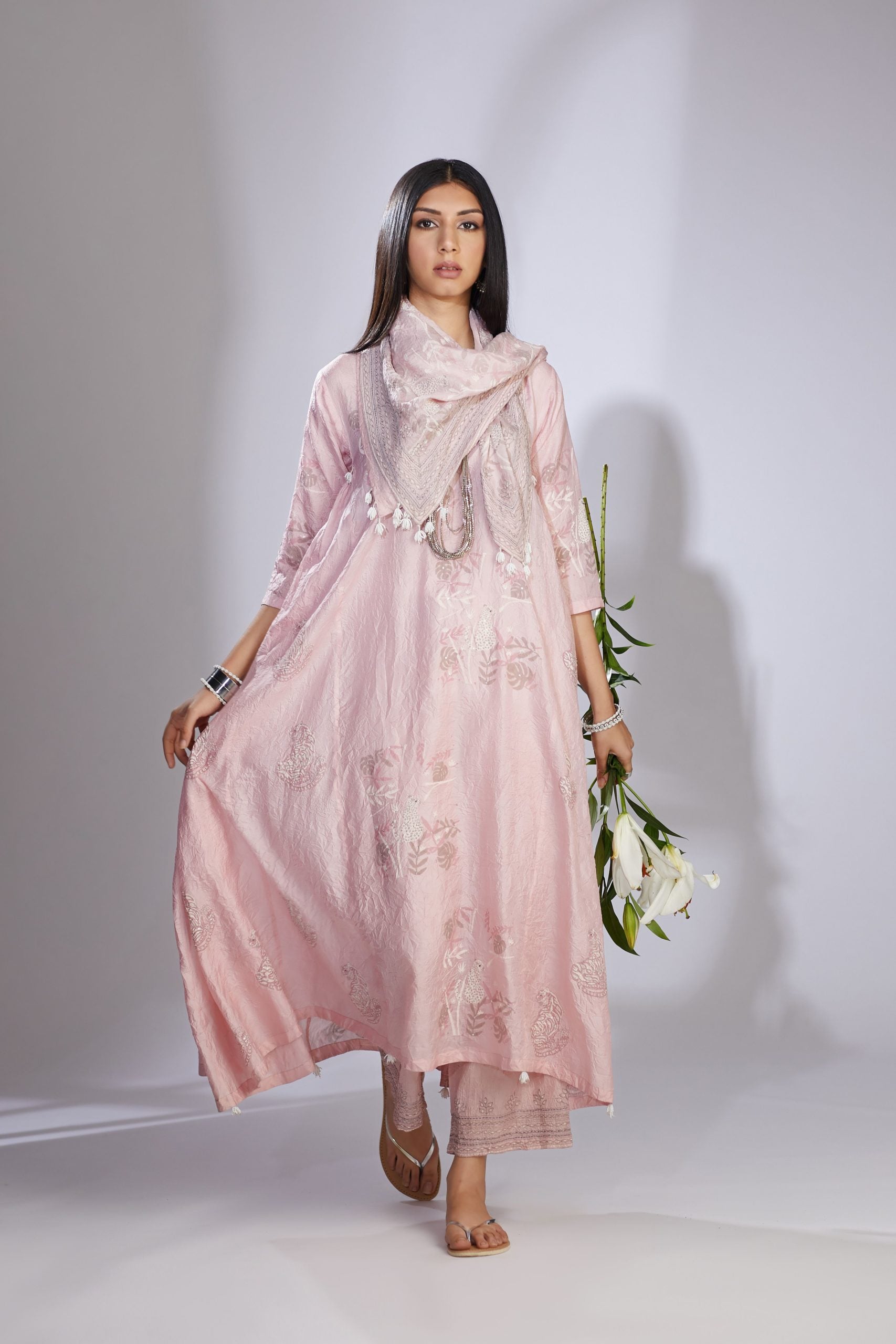 Pink silk hand-crushed asymmetric hem kurta set with block prints embellished with sequins