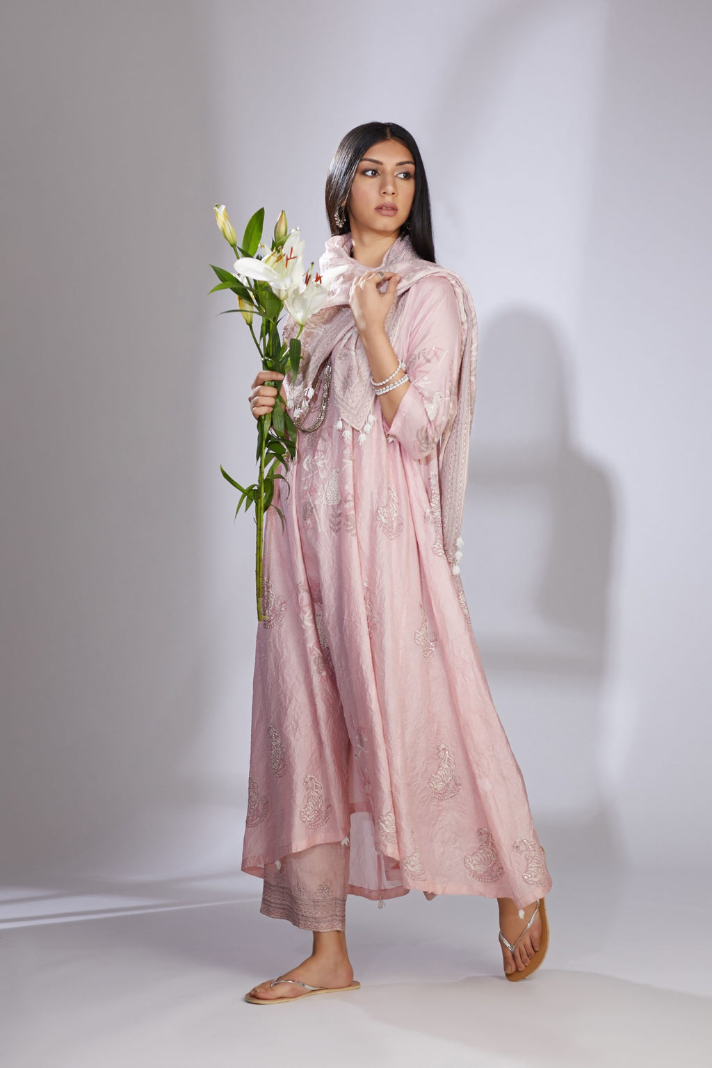 Pink silk hand-crushed asymmetric hem kurta set with block prints embellished with sequins