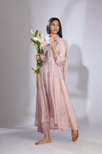 Pink silk hand-crushed asymmetric hem kurta set with block prints embellished with sequins