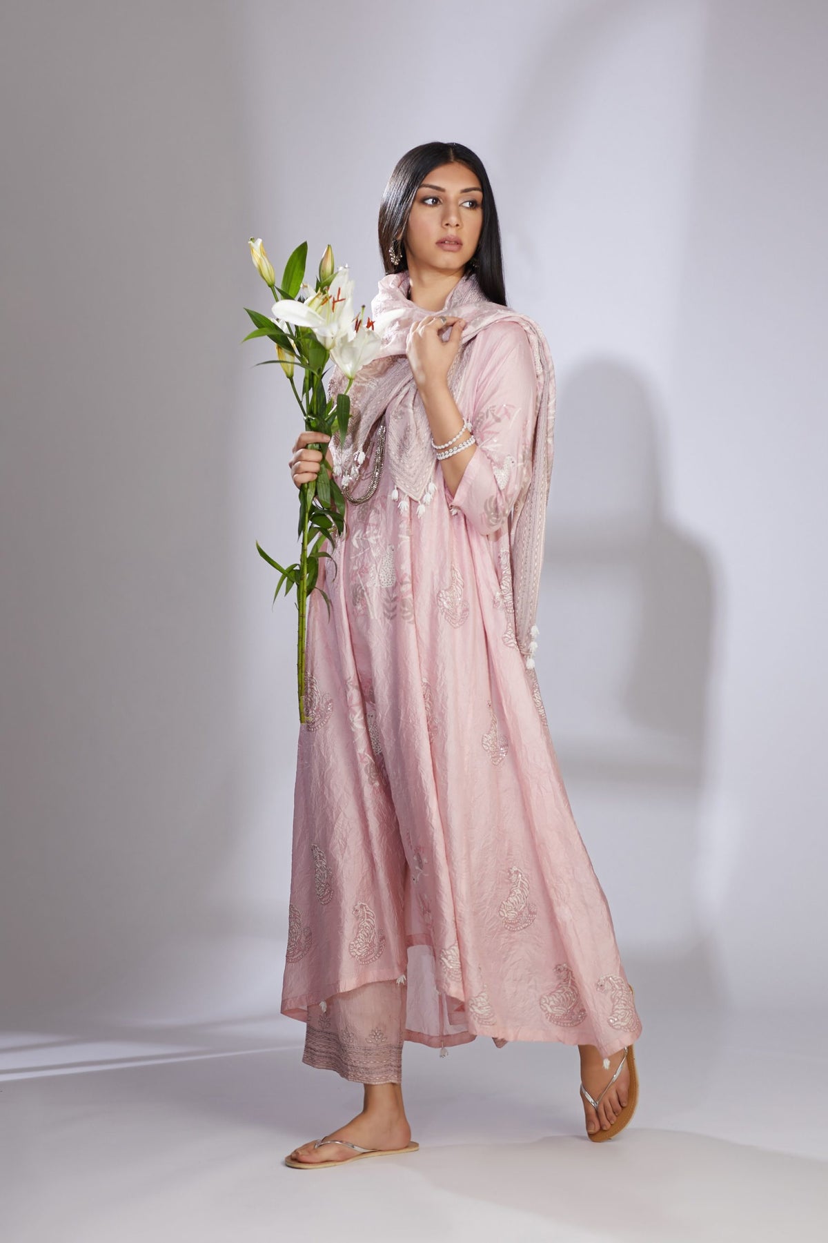 Pink silk hand-crushed asymmetric hem kurta set with block prints embellished with sequins