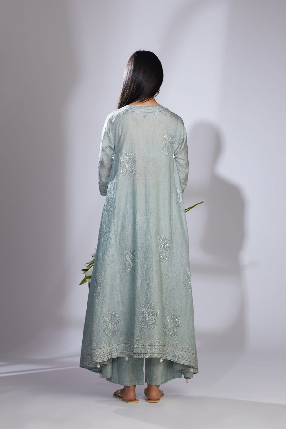 Sea blue hand crushed silk kurta set with asymmetric hem and quilted embroidery