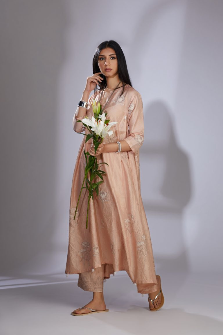 Peach silk hand-crushed asymmetric hem kurta set with block prints embellished with sequins