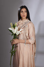 Peach silk hand-crushed asymmetric hem kurta set with block prints embellished with sequins