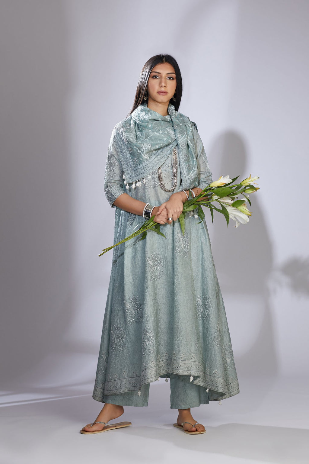 Sea blue hand crushed silk kurta set with asymmetric hem and quilted embroidery